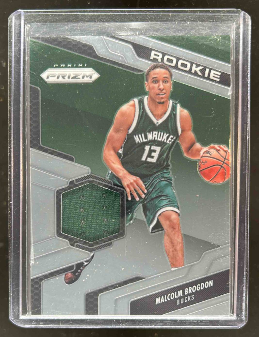 Card image for 2016-17 PANINI PRIZM MALCOLM BROGDON ROOKIE JERSEYS #31 RC MILWAUKEE BUCKS
