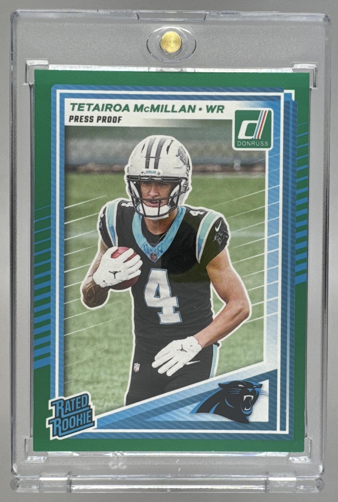 Card image for 2025 Panini Donruss Tetairoa McMillan Rated Rookie Press Proof Blue #314 RC Panthers