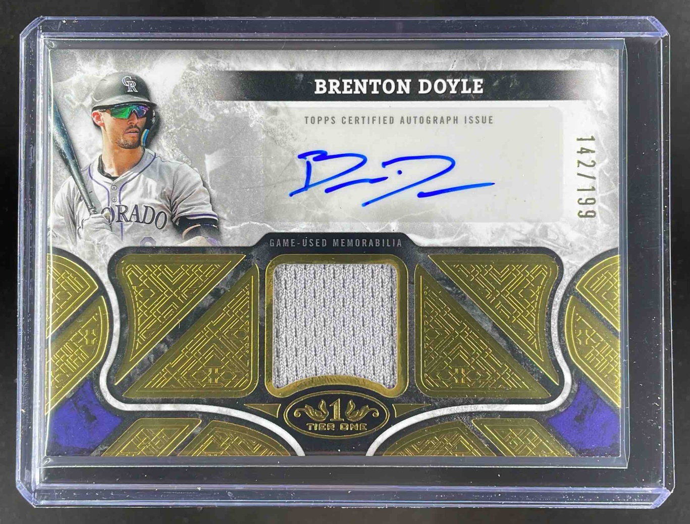 Card image for Brenton Doyle 2025 Topps Tier One Auto Relics /99 #AT1R-BD Colorado Rockies