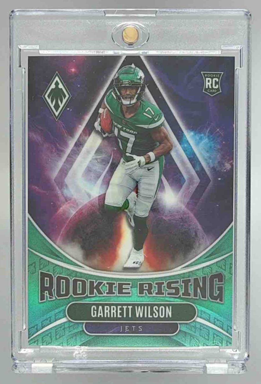 Card image for 2022 Panini Phoenix Garrett Wilson Rookie Rising Teal /150 #RIS-4 RC Jets