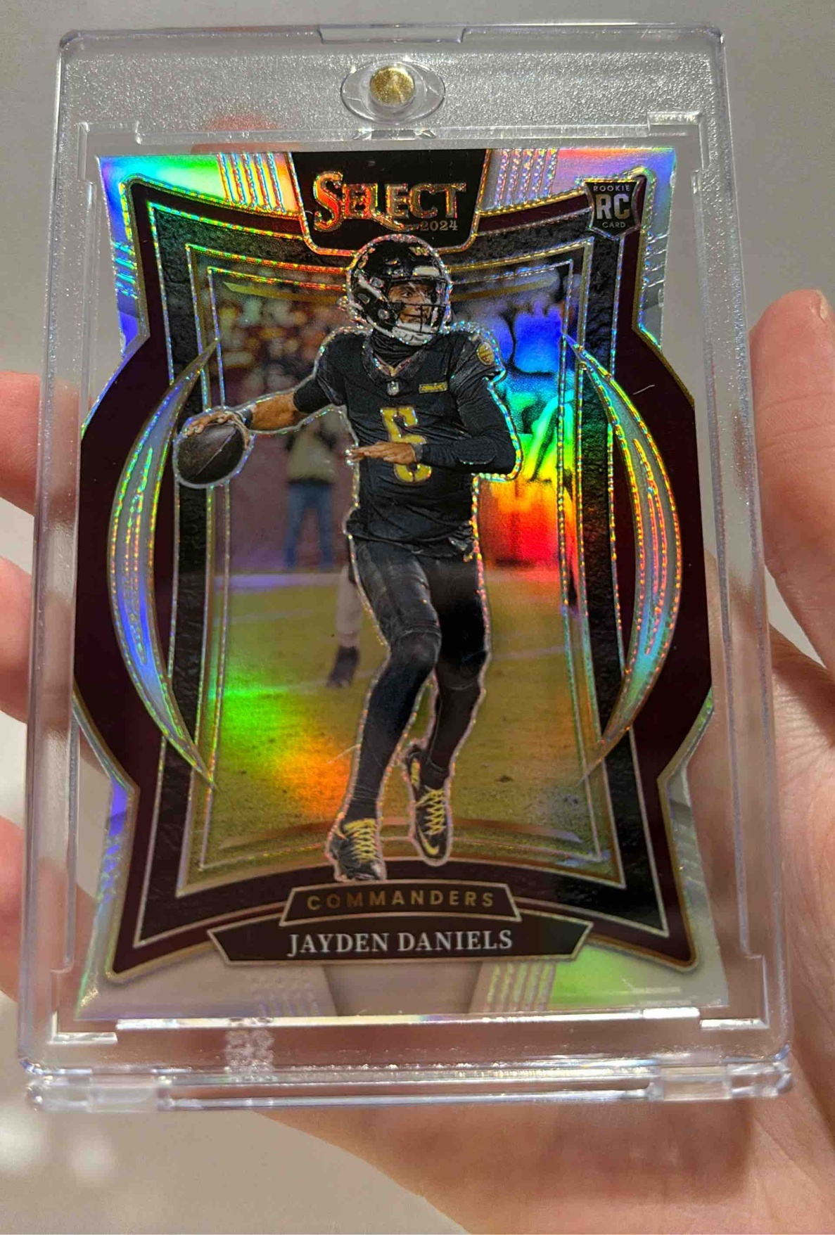 Card image for 2024 Panini Select Jayden Daniels Concourse Silver Prizm Die-Cut #26 RC Commanders