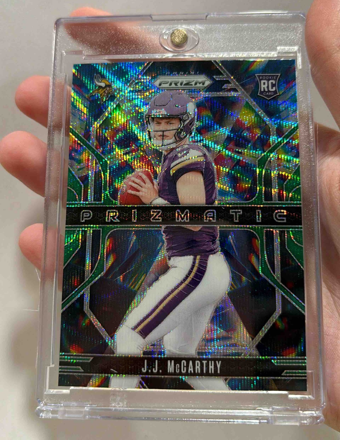 Card image for 2024 Panini Prizm J.J. McCarthy Prizmatic Green Wave #8 RC Vikings