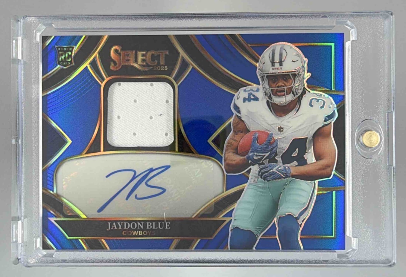 Card image for 2025 Panini Select Jaydon Blue Rookie Signature Memorabilia Prizm /149 #RSMP-JBE MEM RC Auto Cowboys