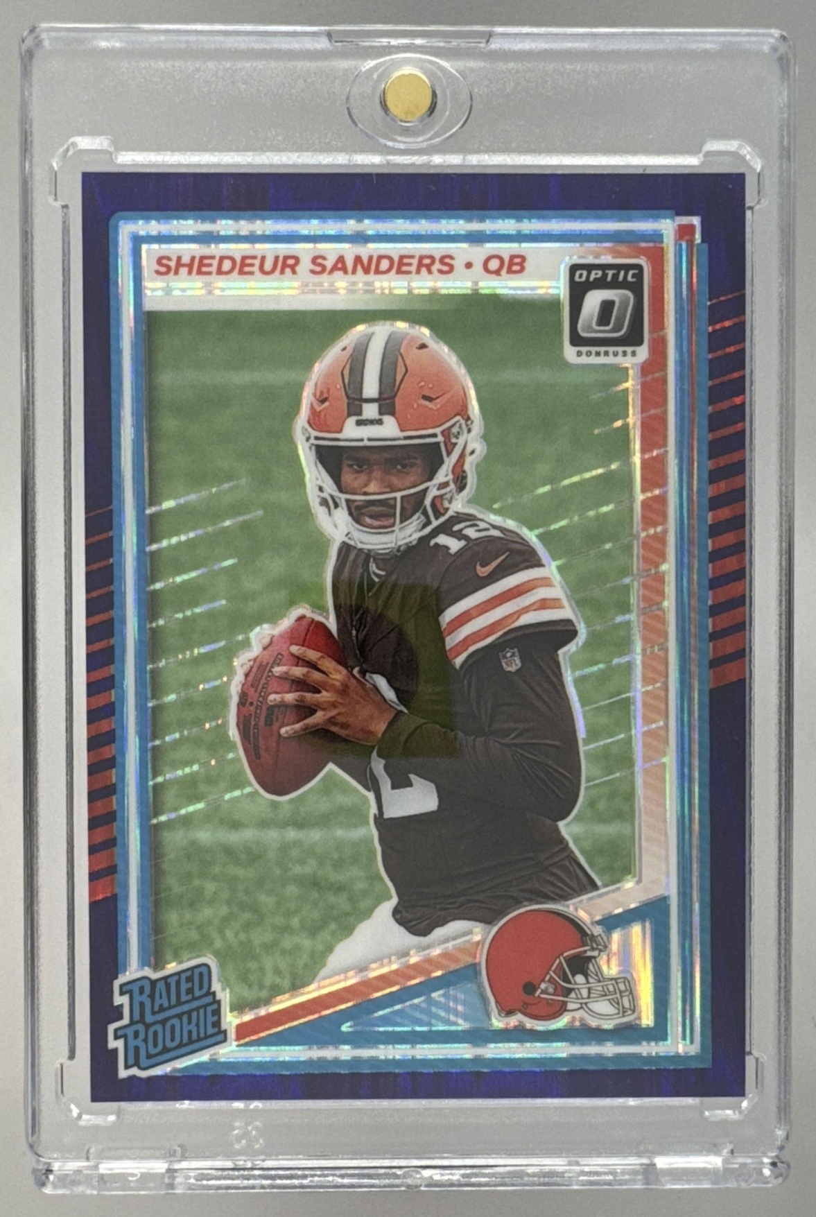 Card image for 2025 Panini Donruss Optic Shedeur Sanders Rated Rookie Purple Shock Prizm #203 Browns