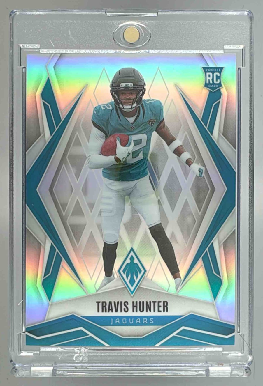 Card image for 2025 Panini Football Phoenix Travis Hunter #157 RC Jacksonville Jaguars