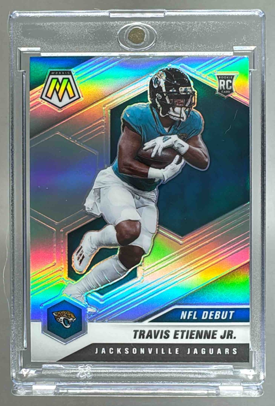 Card image for 2021 Panini Mosaic Travis Etienne Jr. Prizm Silver #253 RC Jaguars