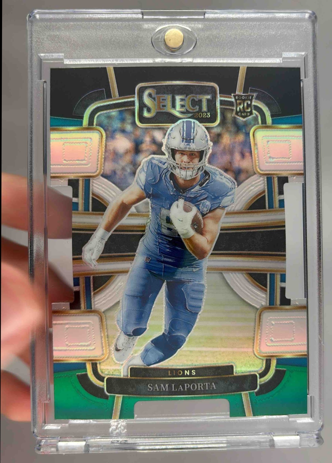 Card image for 2023 Panini Select Sam LaPorta Black and Gold Prizms Die Cut #35 RC Concourse Lions