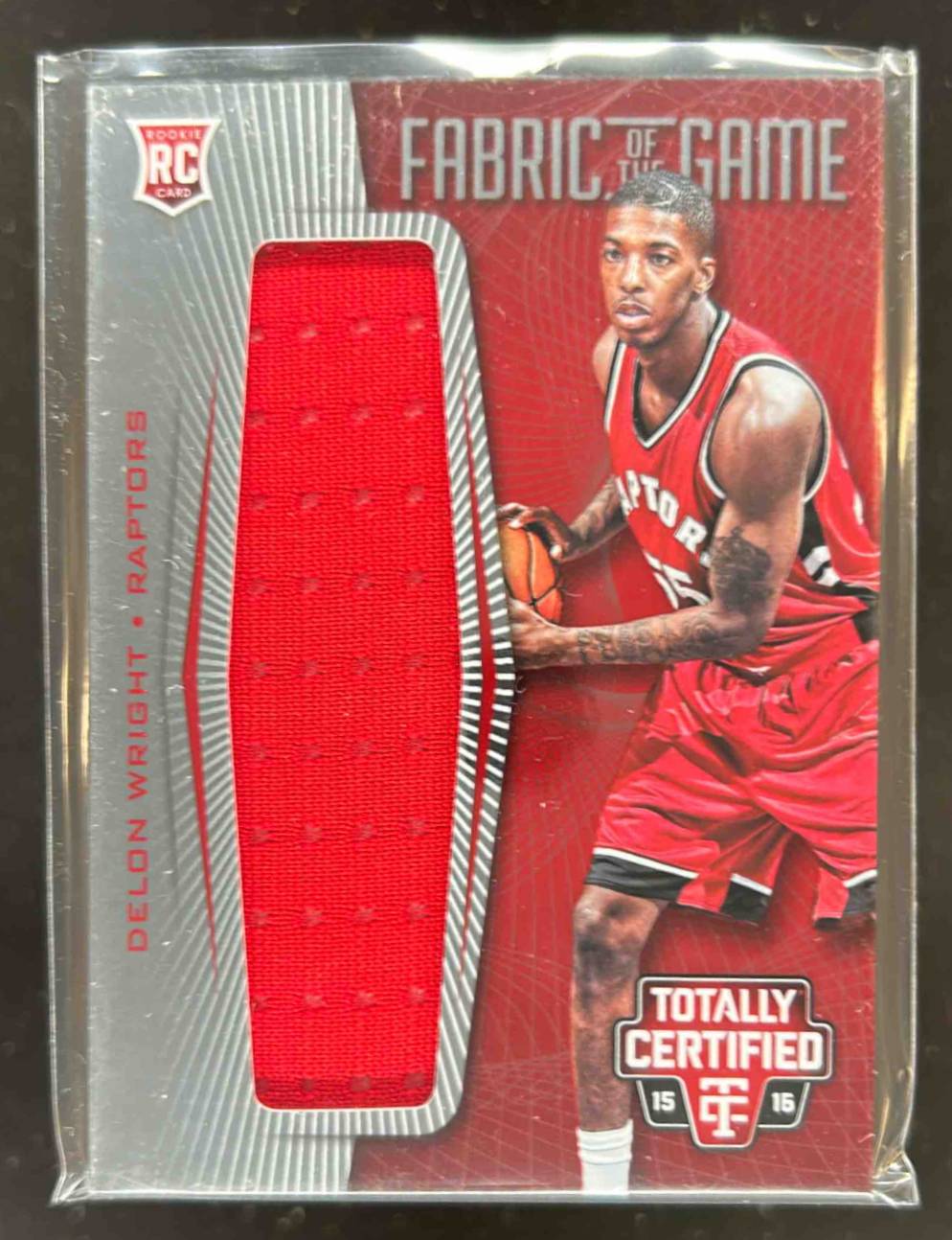 Card image for 2015-16 Panini Totally Certified Delon Wright Fabric of the Game Rookie Jersey Red 125 /199 #FRJ-DW RC