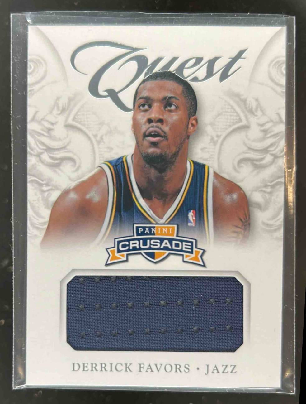 Card image for 2012-13 PANINI CRUSADE DERRICK FAVORS QUEST MEMORABILIA #8 UTAH JAZZ