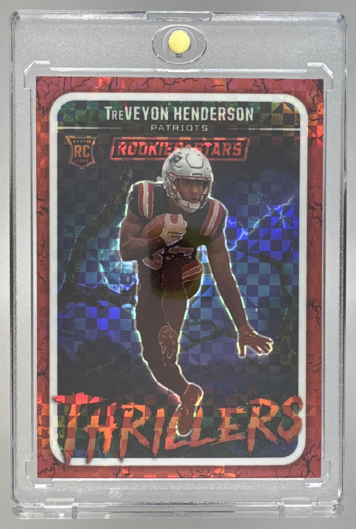 Card image for 2025 Panini Rookies & Stars TreVeyon Henderson Cross Training #CT-THN MEM RC Patriots