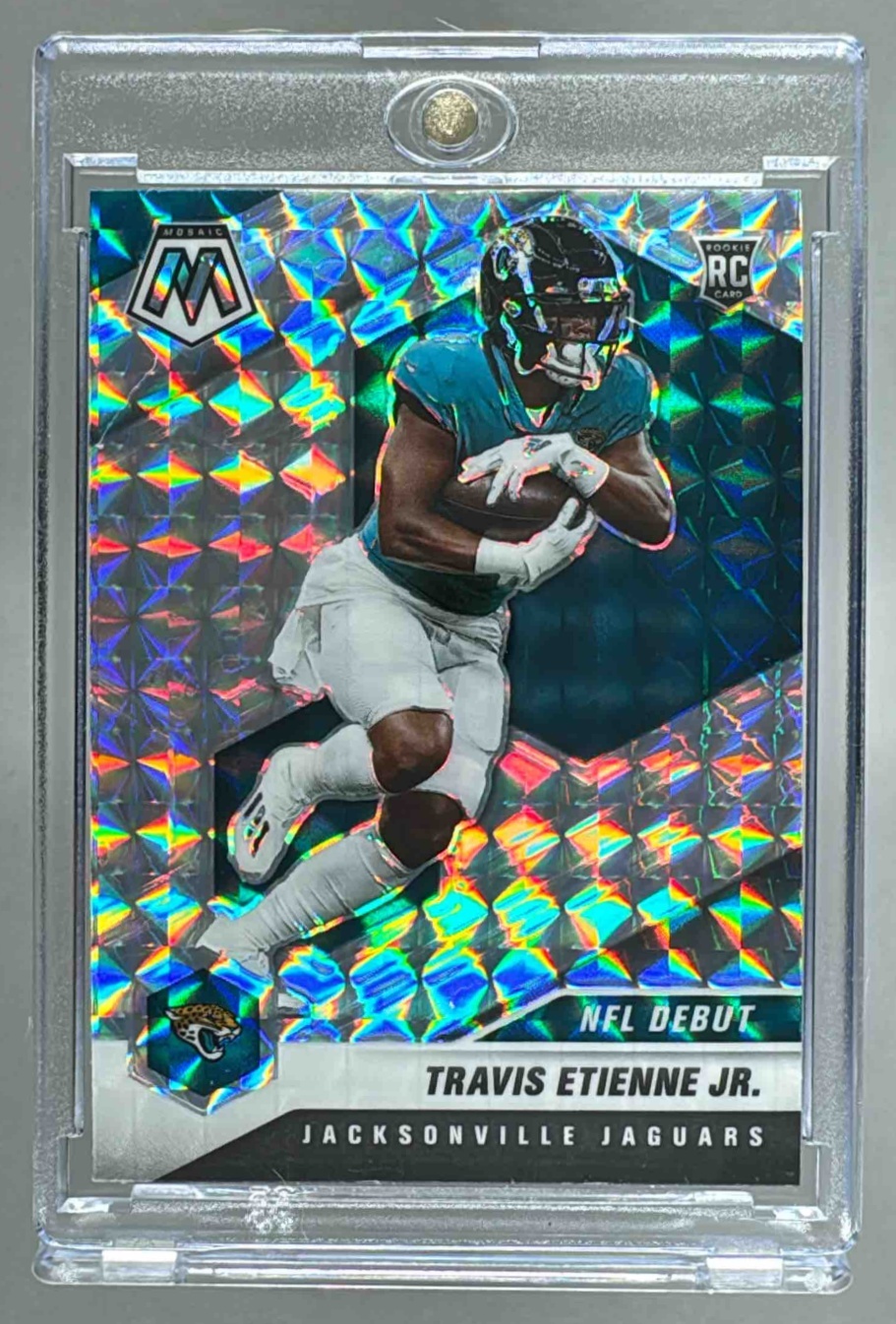 Card image for 2021 Panini Mosaic Travis Etienne Jr. Mosaic Prizm #253 RC Jaguars