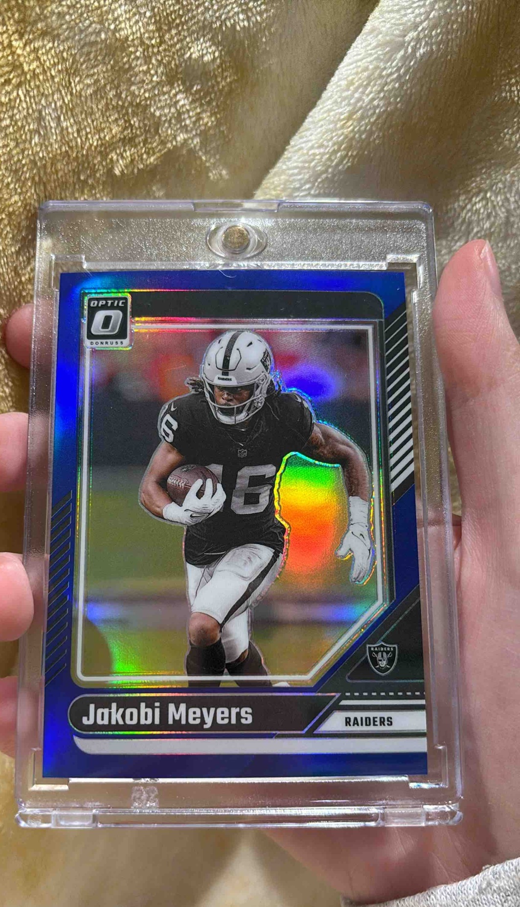 Card image for 2024 Panini Donruss Optic Jakobi Meyers Blue /199 #102 Raiders