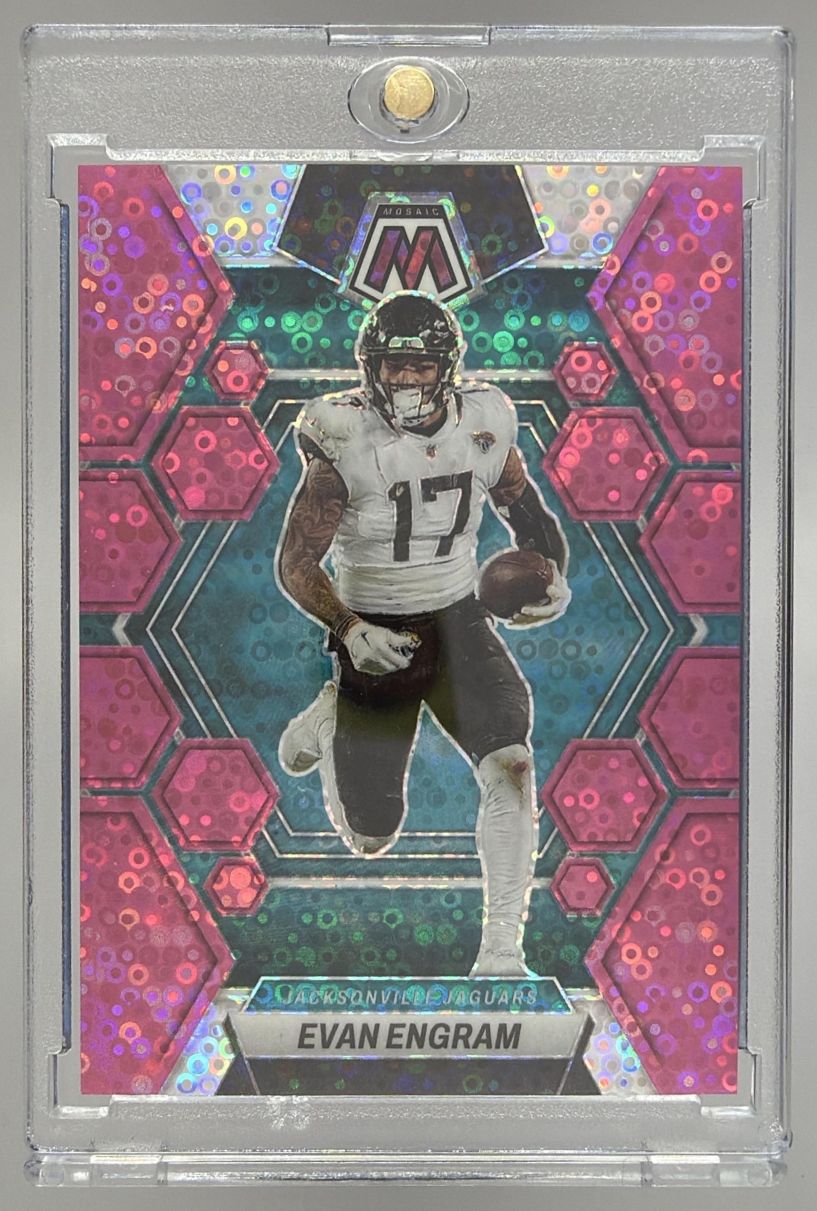 Card image for 2023 Panini Mosaic Evan Engram Pink No Huddle Mosaic Prizm /20 #106 Jaguars