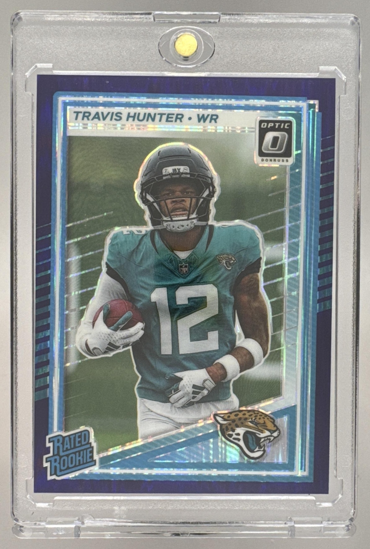 Card image for 2025 Panini Donruss Optic Travis Hunter Rated Rookie Green Hyper Prizm #201 Jaguars
