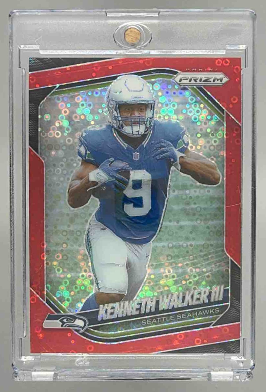 Card image for 2025 Panini Prizm Kenneth Walker III No Huddle Red /99 #272 Seahawks