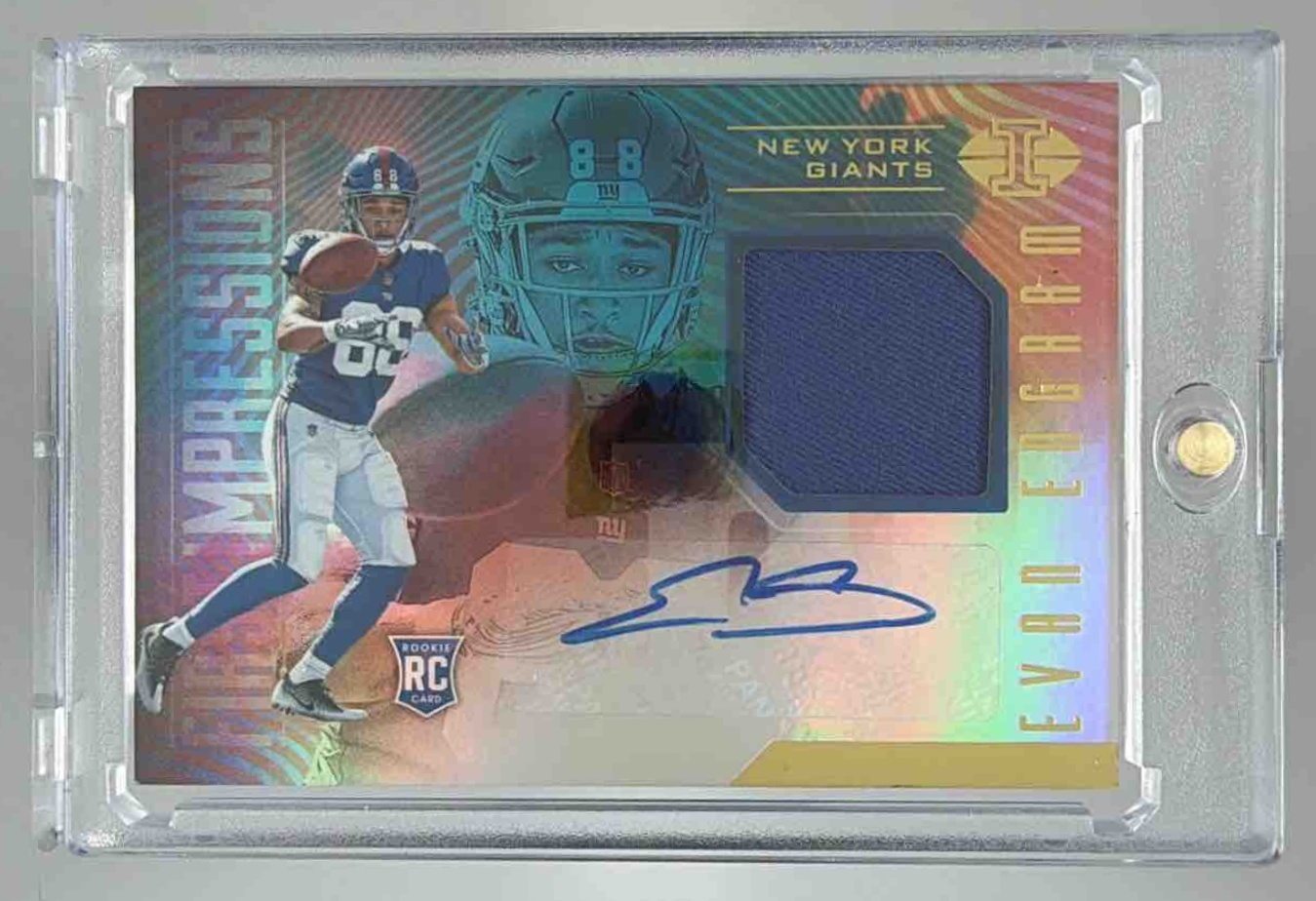 Card image for 2017 Panini Illusions Evan Engram First Impressions Memorabilia Blue /100 #FI-EE RC Giants