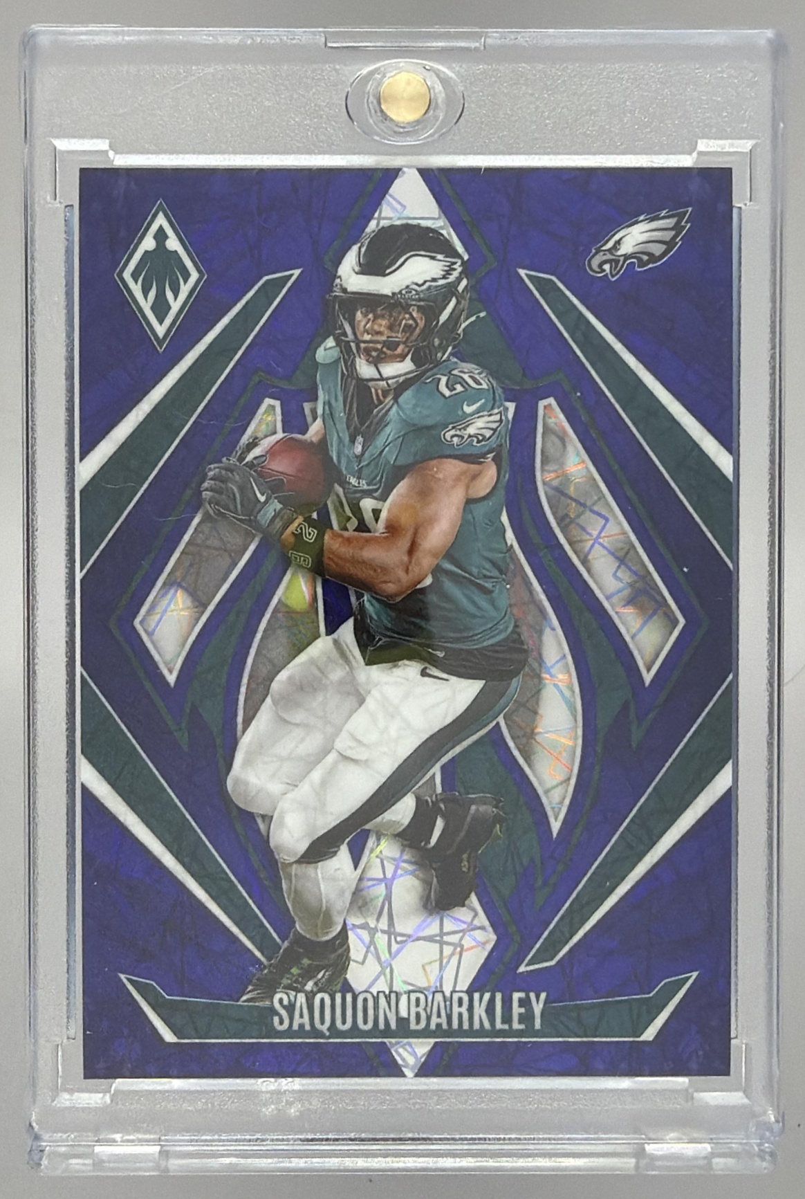 Card image for 2024 Panini Phoenix Saquon Barkley Gold Fade /125 #128 Eagles