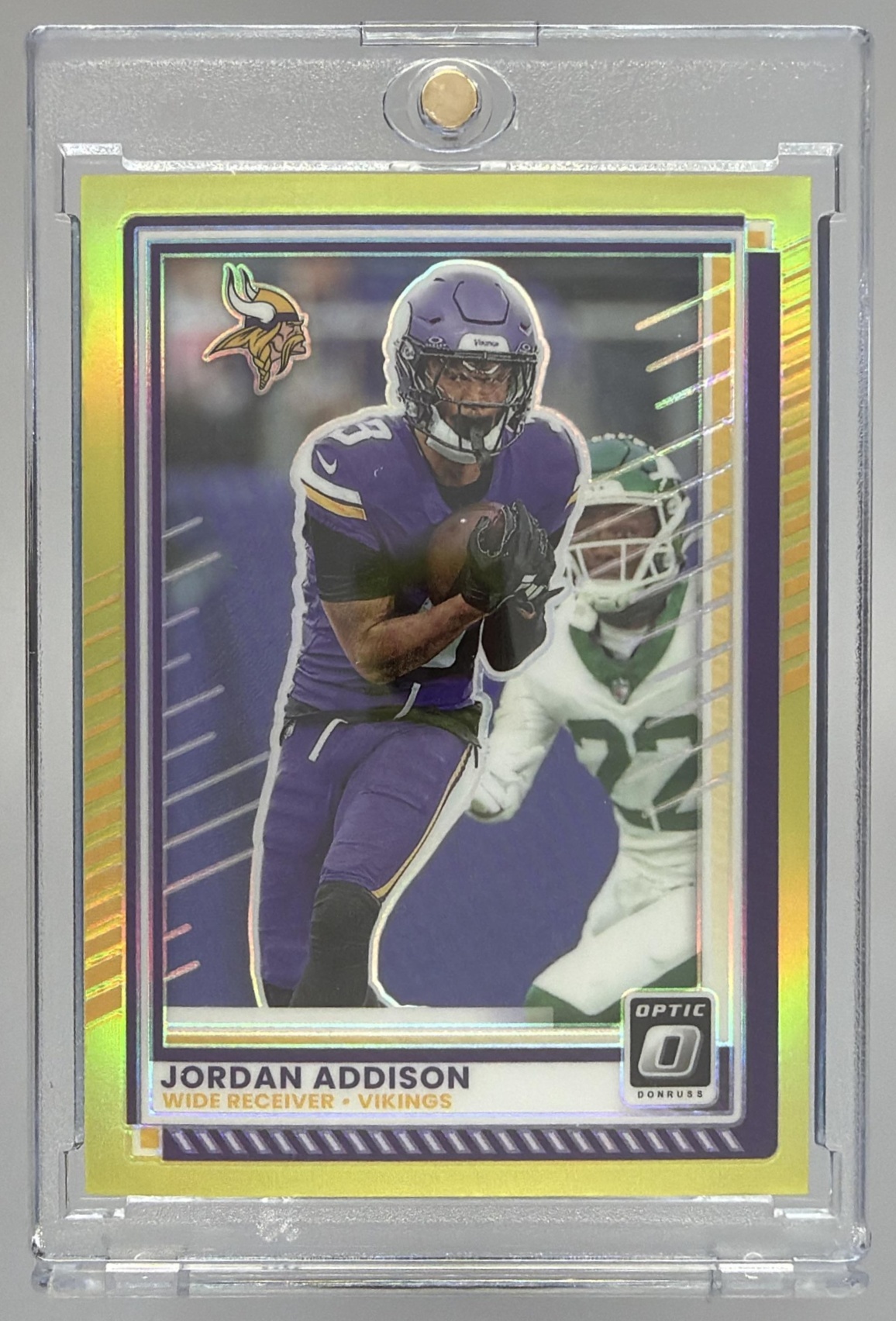 Card image for 2025 Panini Donruss Optic Jordan Addison Neon Yellow Prizm /15 #35 Vikings