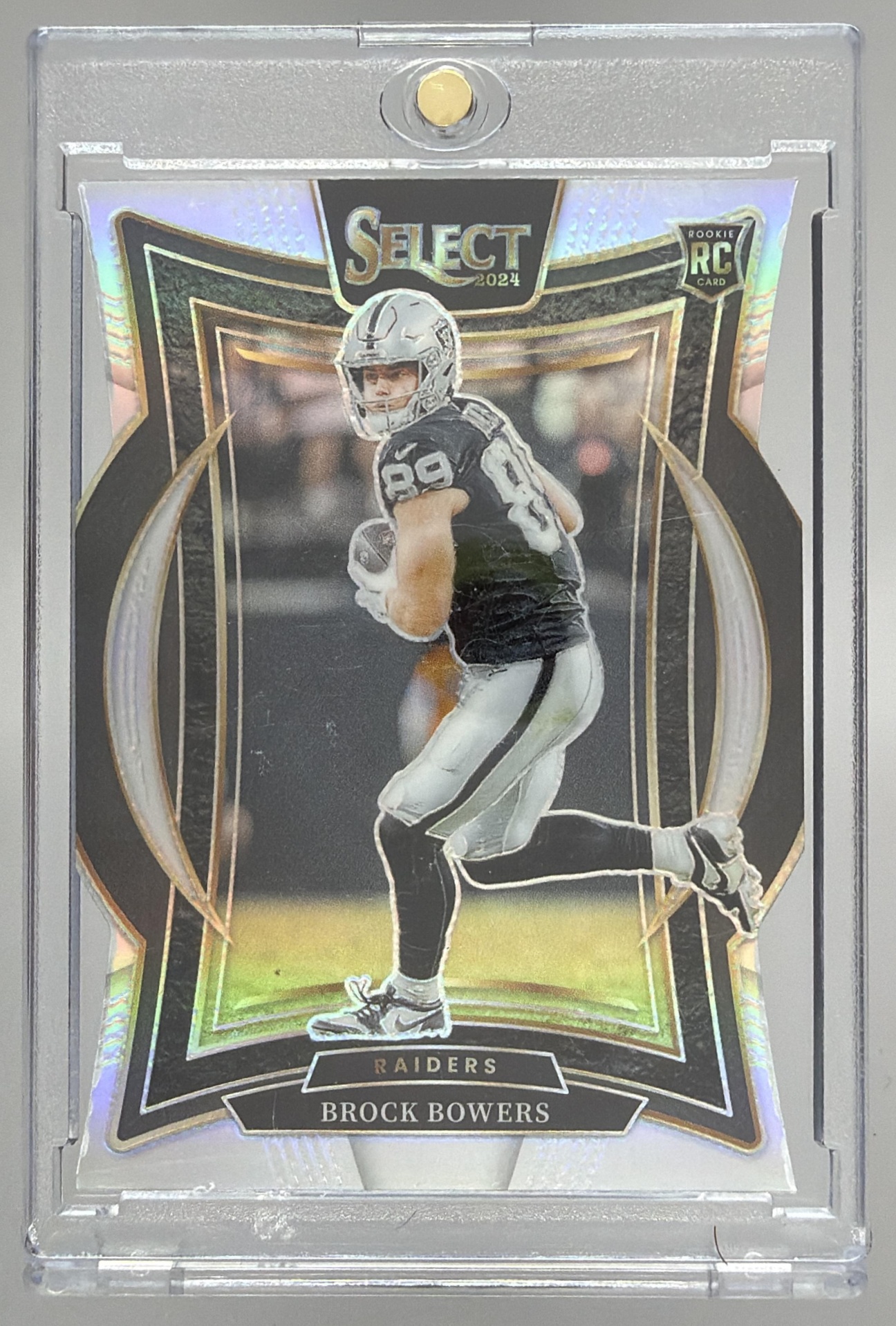 Card image for 2024 Panini Select Brock Bowers Concourse Silver Prizm #31 RC Raiders