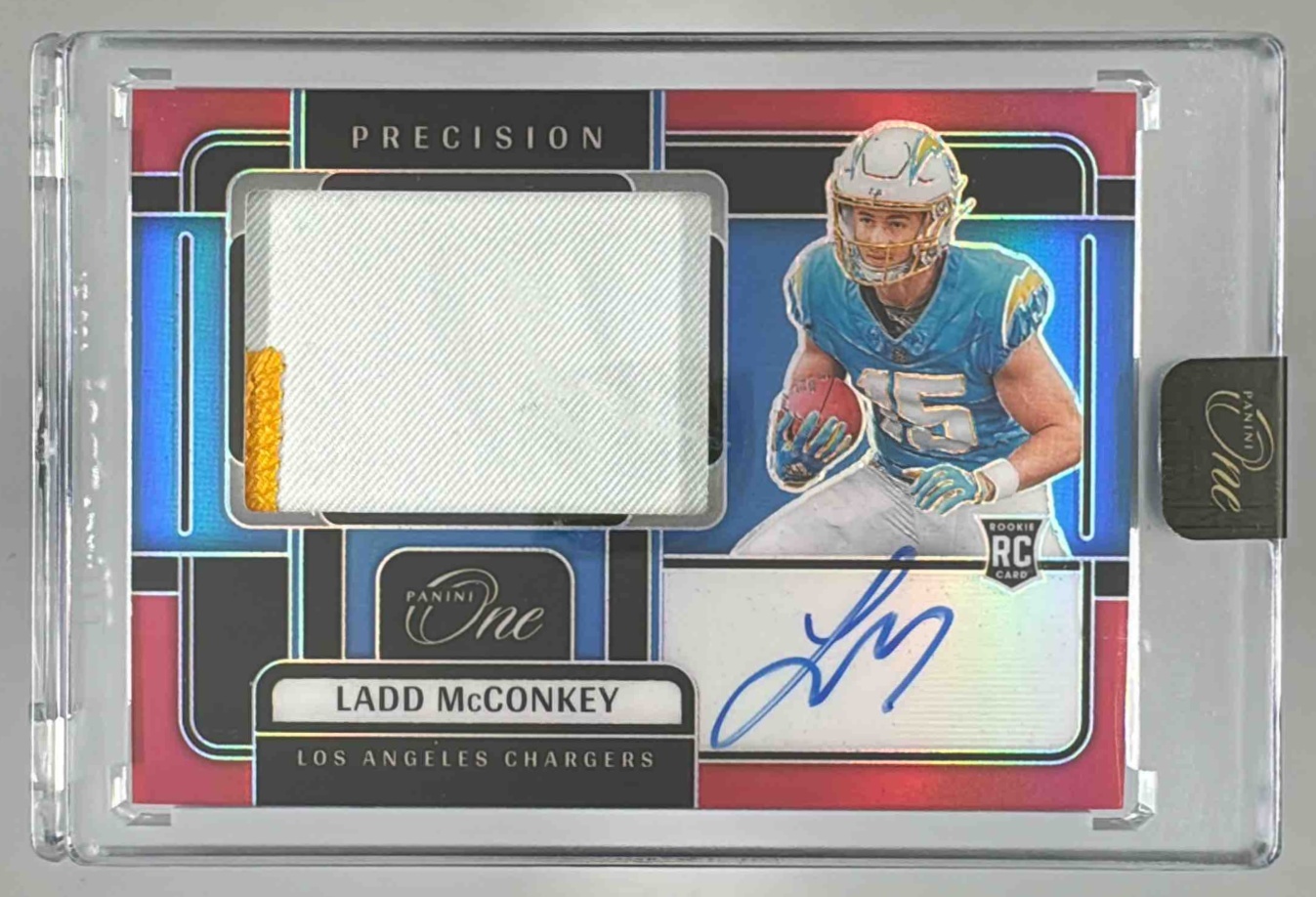 Card image for 2024 Panini One Ladd McConkey Precision Rookie Patch Auto Red /60 #309 MEM RC Chargers