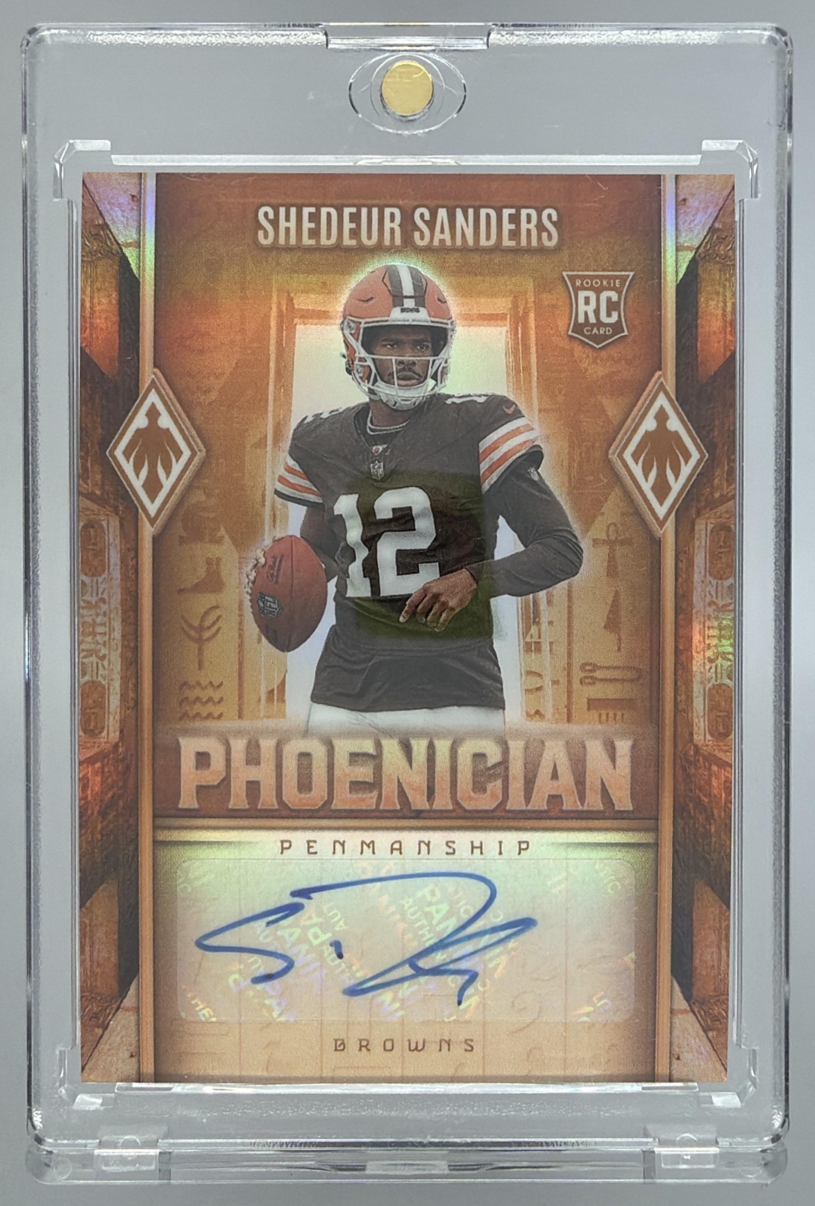 Card image for 2025 Panini Phoenix Shedeur Sanders Phoenician Penmanship #PHP-SSS RC Auto Browns
