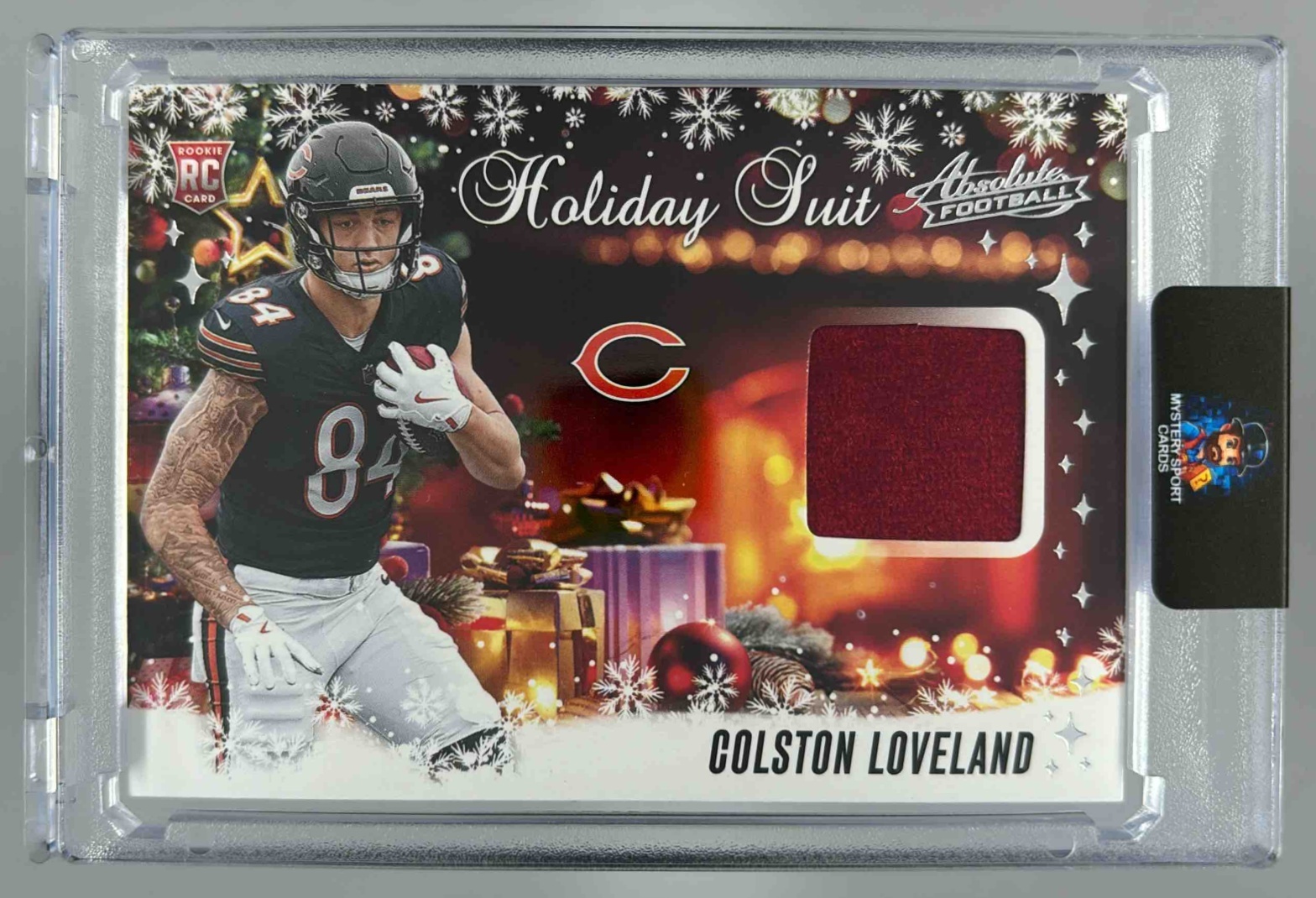Card image for 2025 Panini Absolute Colston Loveland Holiday Suit #HS-CLD RC MEM Bears
