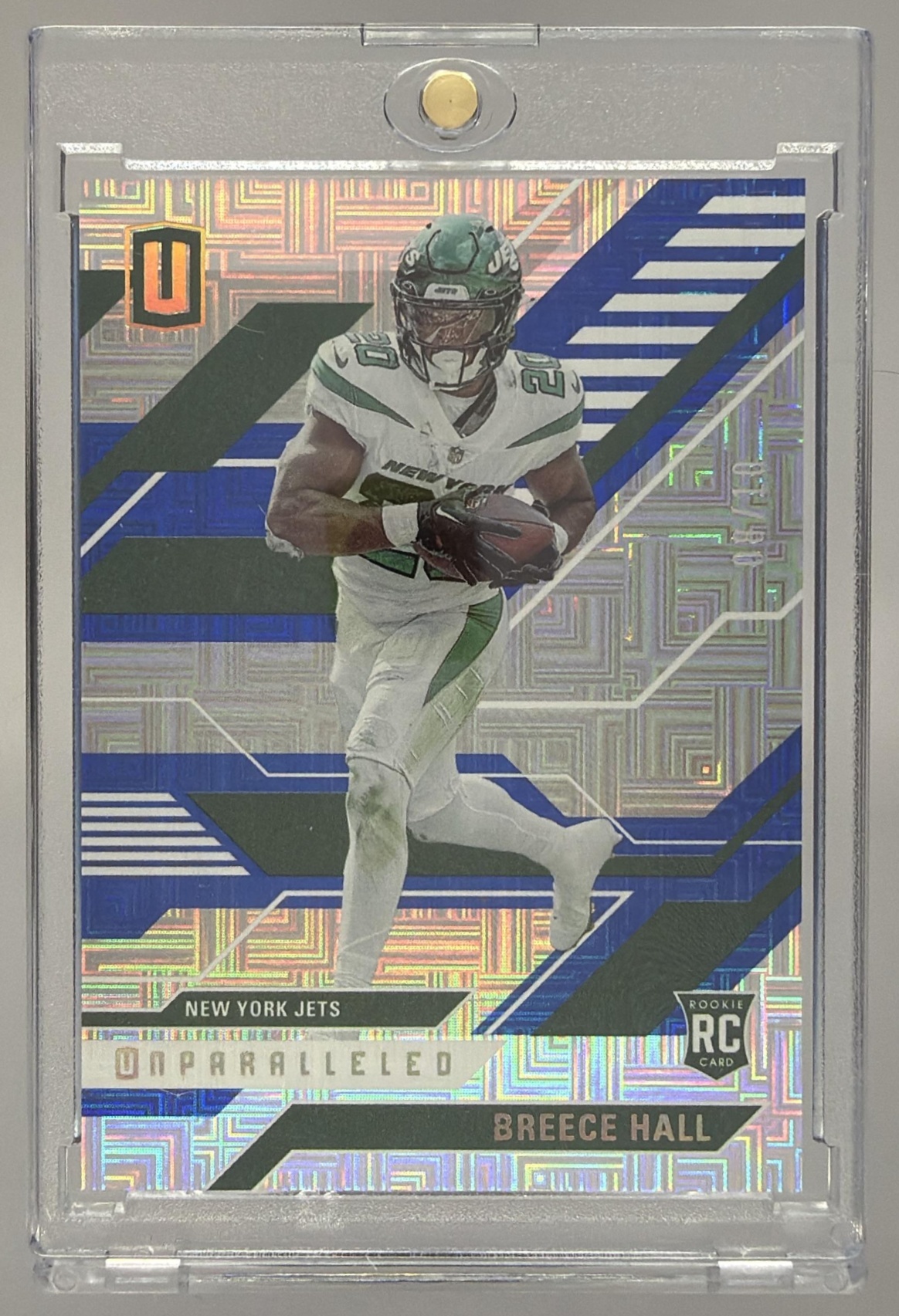 Card image for 2022 Panini Chronicles Breece Hall Unparalleled #UNP-20 RC Jets