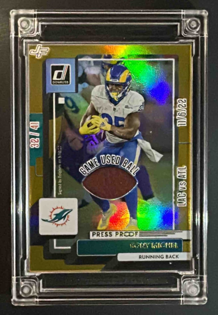 Card image for 2022 Panini Donruss Sony Michel #16 Press Proof 32/41 Game Used Ball