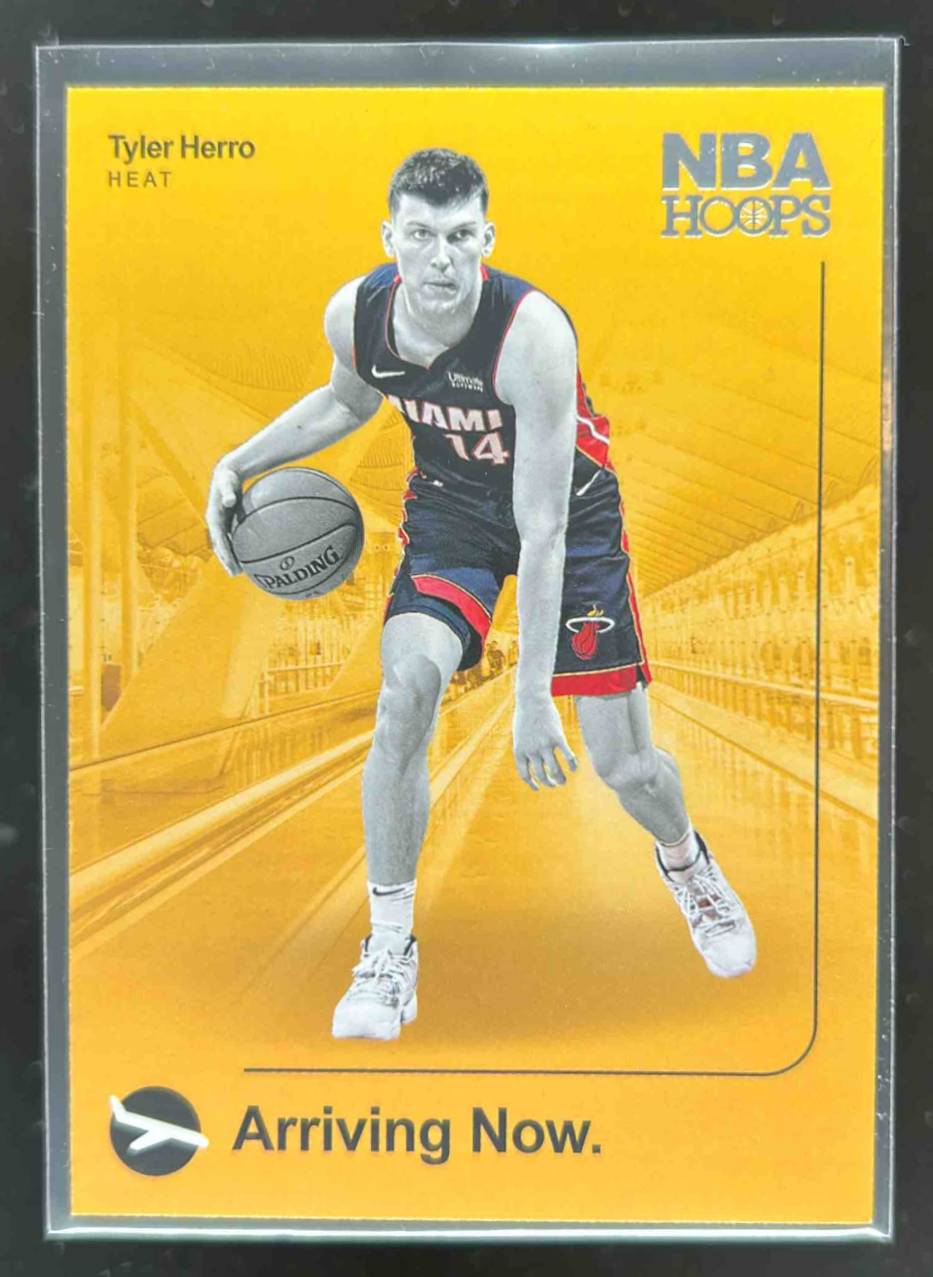 Card image for 2019-20 PANINI HOOPS TYLER HERRO ARRIVING NOW HOLO #13 RC ROOKIE MIAMI HEAT