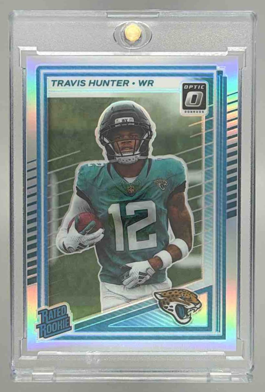 Card image for 2025 Panini Donruss Optic Travis Hunter Rated Rookie Holo Prizm #201 Jaguars
