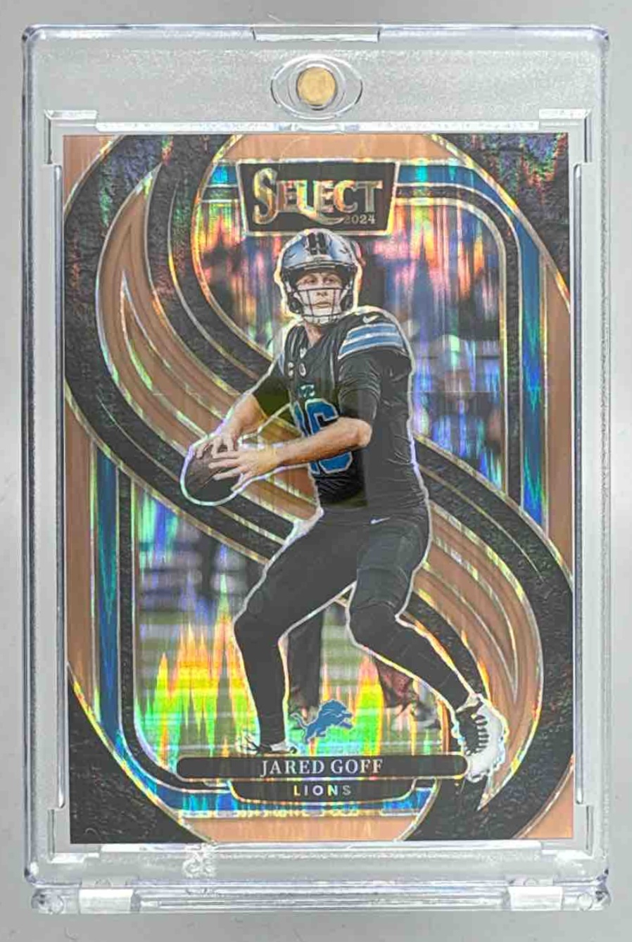 Card image for 2024 Panini Select Jared Goff Premier Copper Prizm Shock /299 #123 Lions