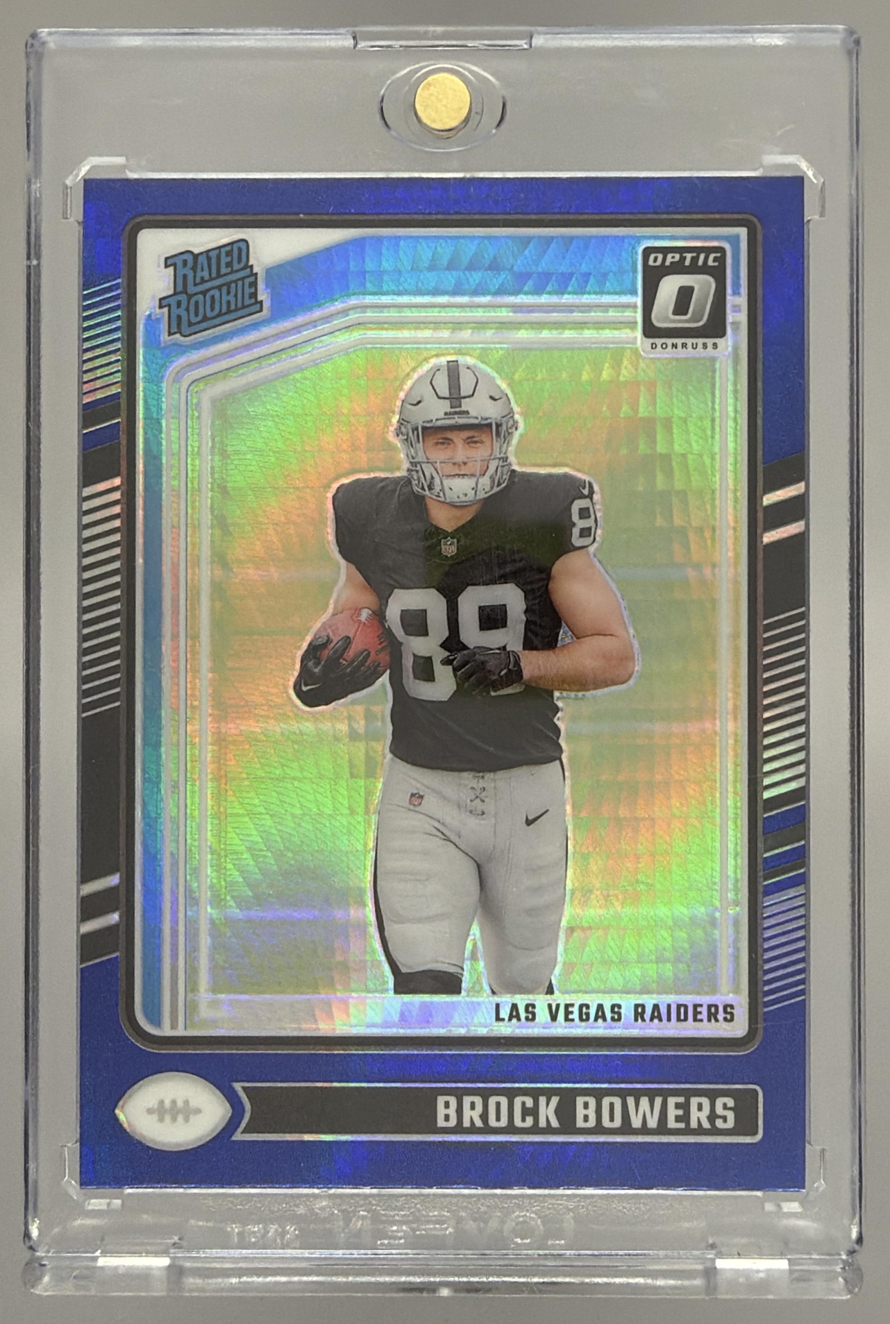 Card image for 2024 Panini Donruss Optic Brock Bowers Blue Hyper #215 Rated Rookie Raiders