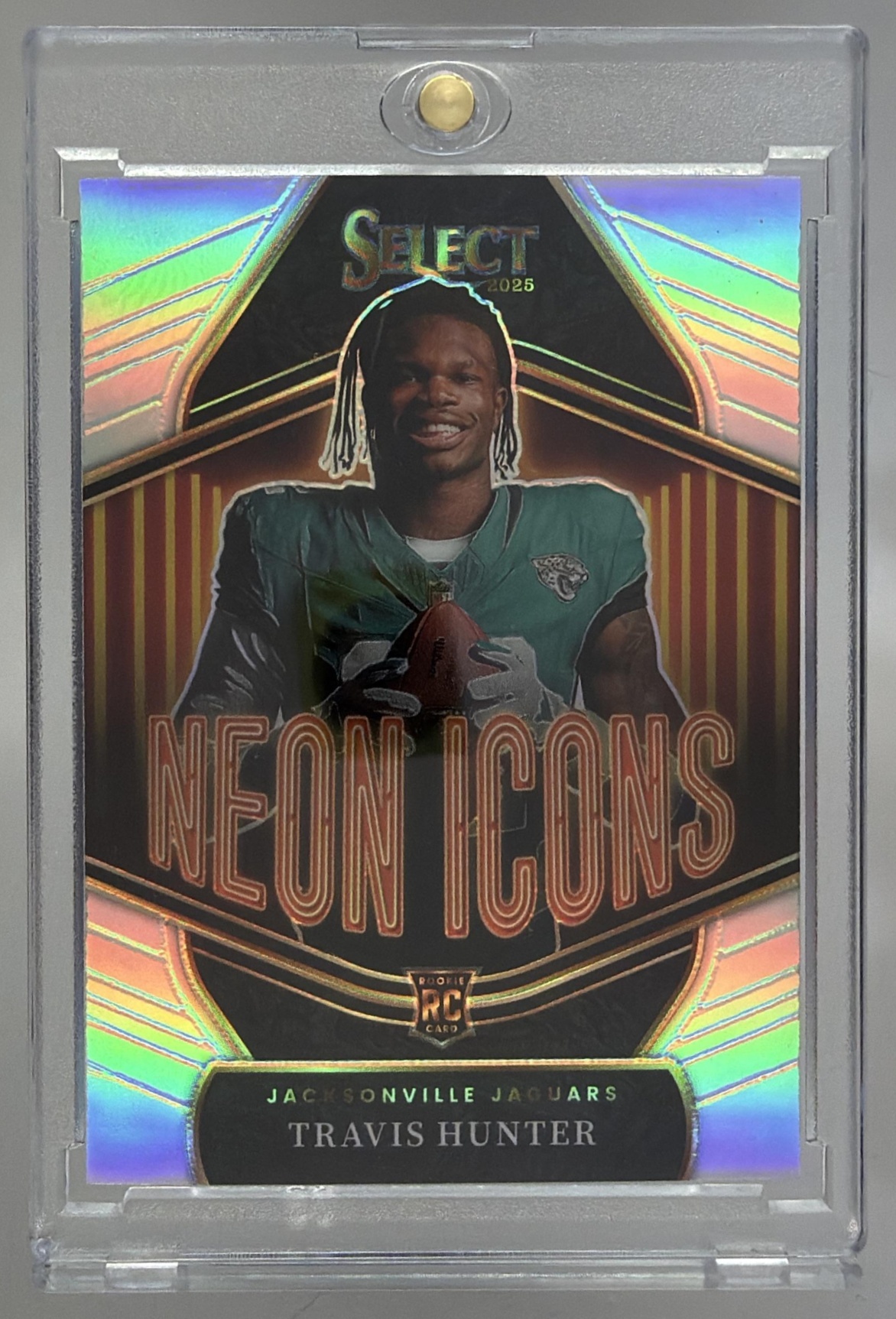 Card image for 2025 Panini Football Select Travis Hunter Neon Icons #11 Jacksonville Jaguars