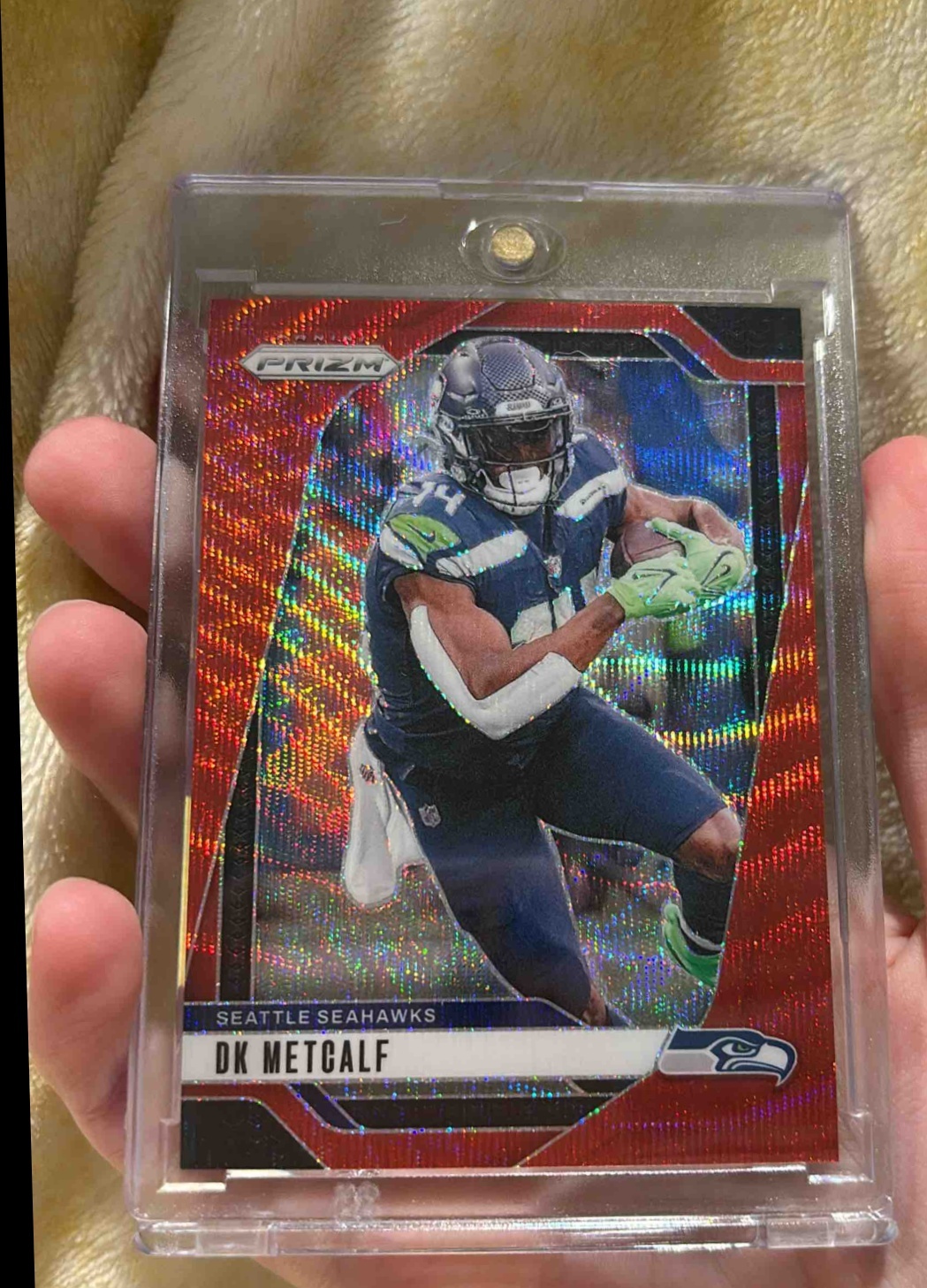Card image for 2024 Panini Football Prizm DK Metcalf Red Wave /149 #261 Seattle Seahawks