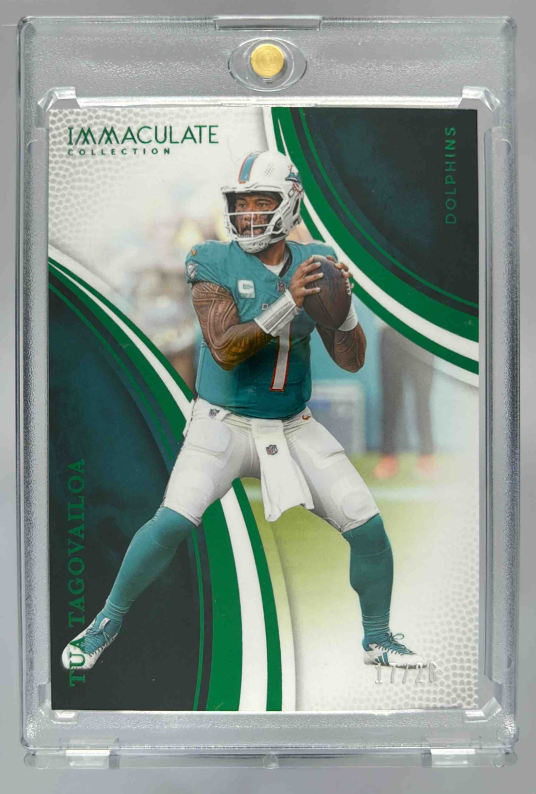 Card image for 2025 Panini Immaculate Collection Tua Tagovailoa /99 #49 Action Variation Dolphins