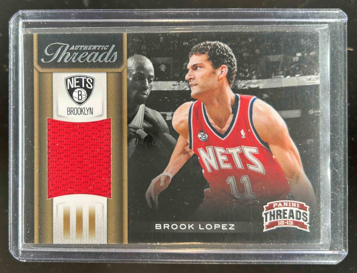 Card image for 2012-13 PANINI THREADS BROOK LOPEZ #37 AUTHENTIC BROOKLYN NETS