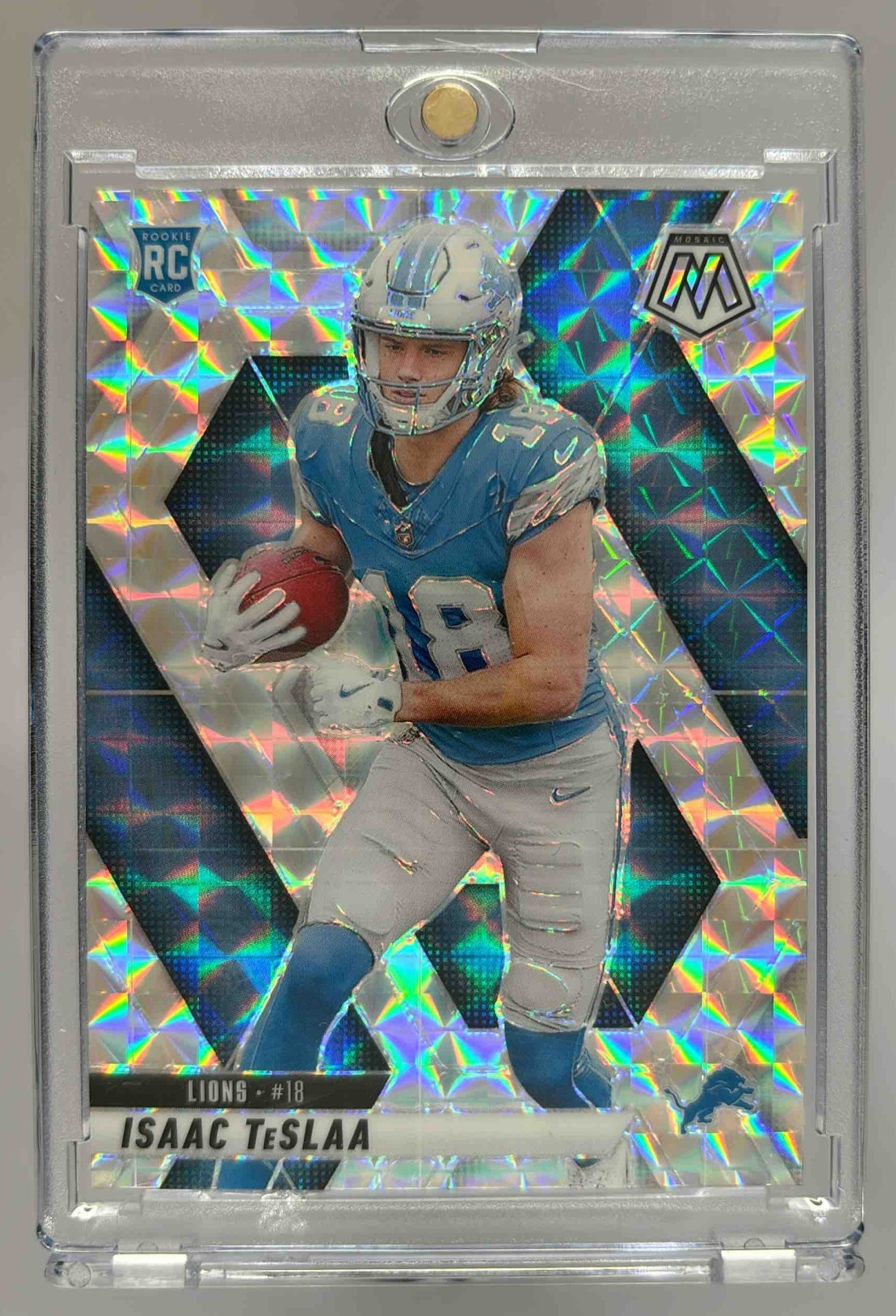Card image for 2025 Panini Mosaic Isaac TeSlaa Rookies Mosaic Prizm #319 RC Lions