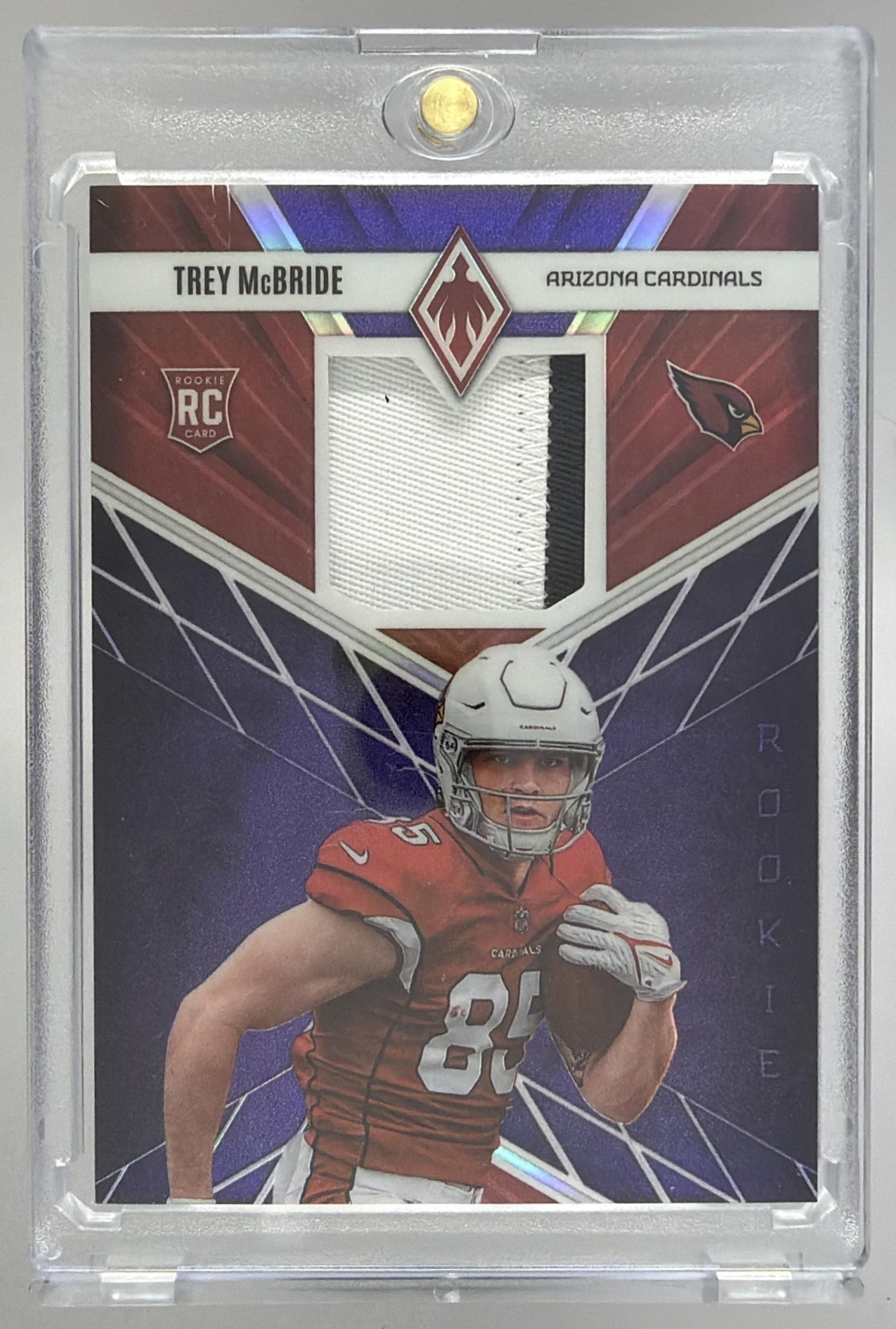 Card image for 2022 Panini Phoenix Trey McBride Rookie Memorabilia Purple /75 #RME-27 RC Cardinals