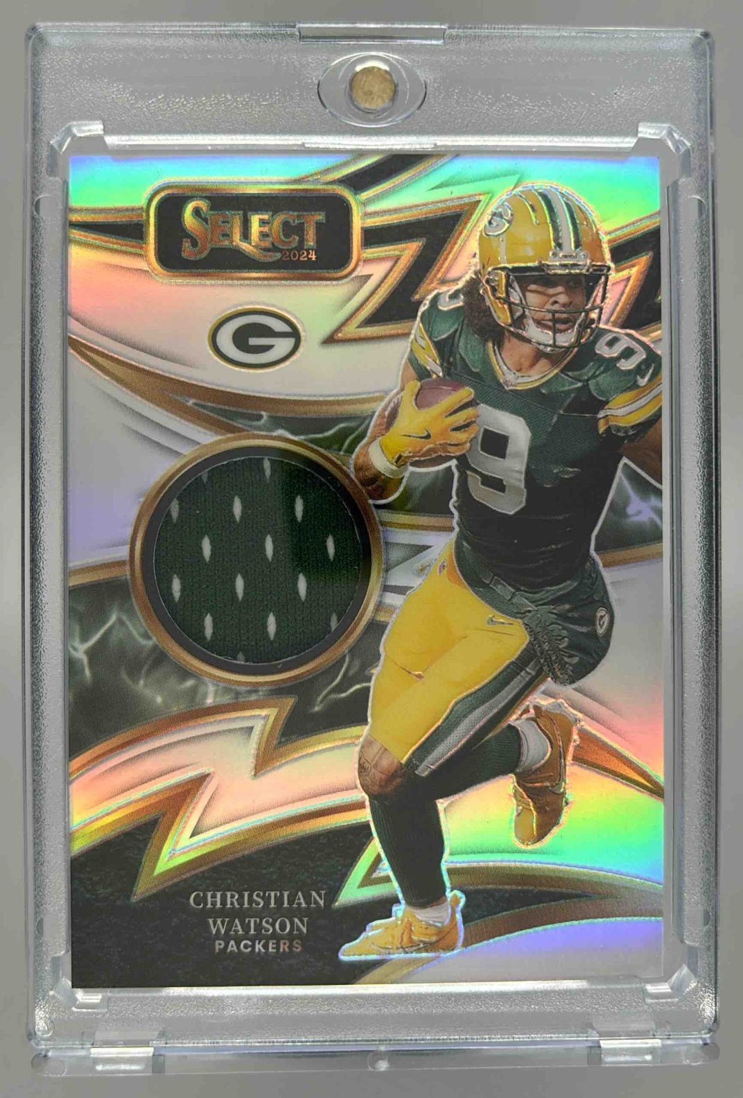 Card image for 2024 Panini Select Christian Watson Sparks /149 #S-CWN MEM Packers