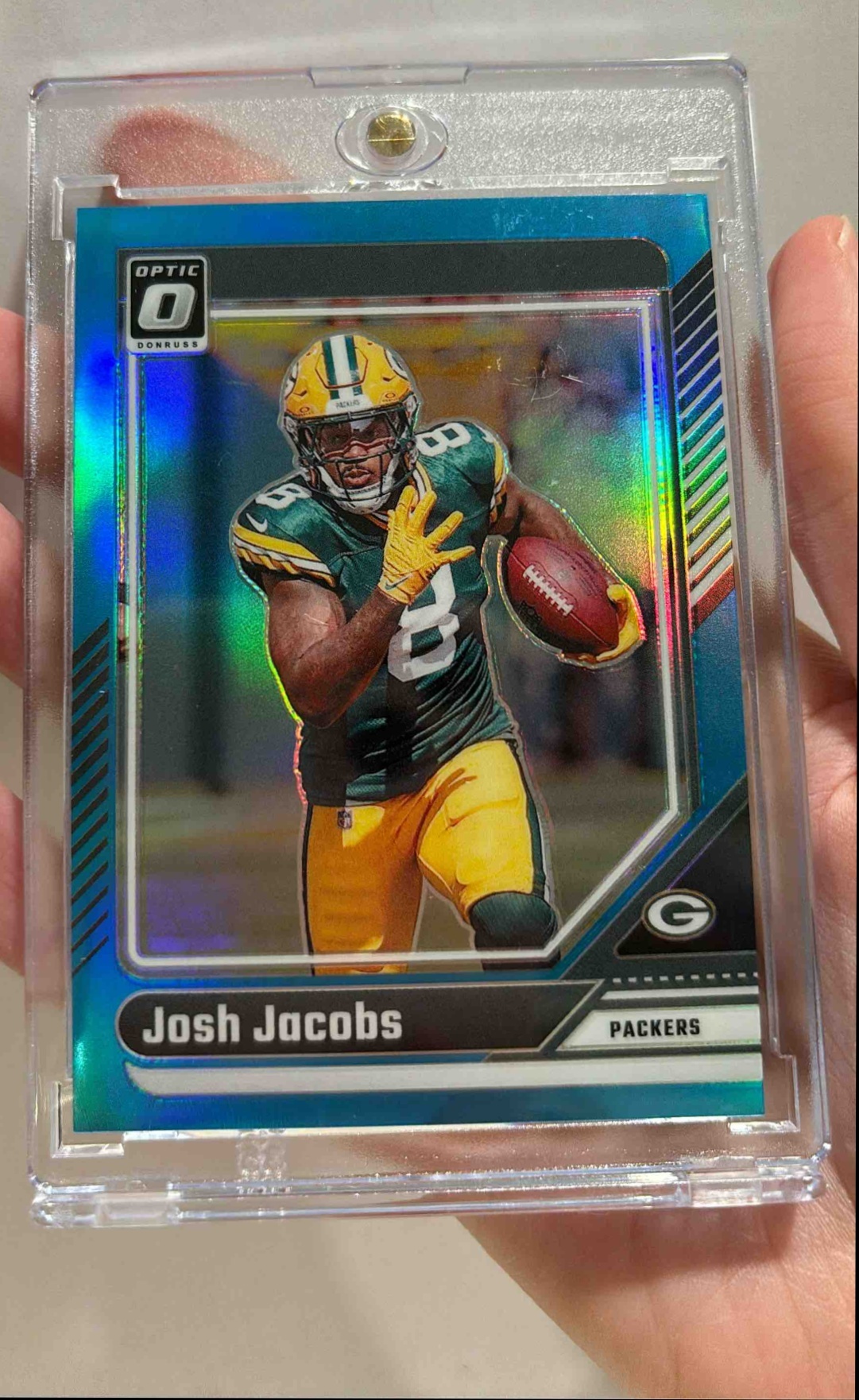 Card image for 2024 Panini Football Donruss Optic Josh Jacobs Aqua /299 #70 Green Bay Packers