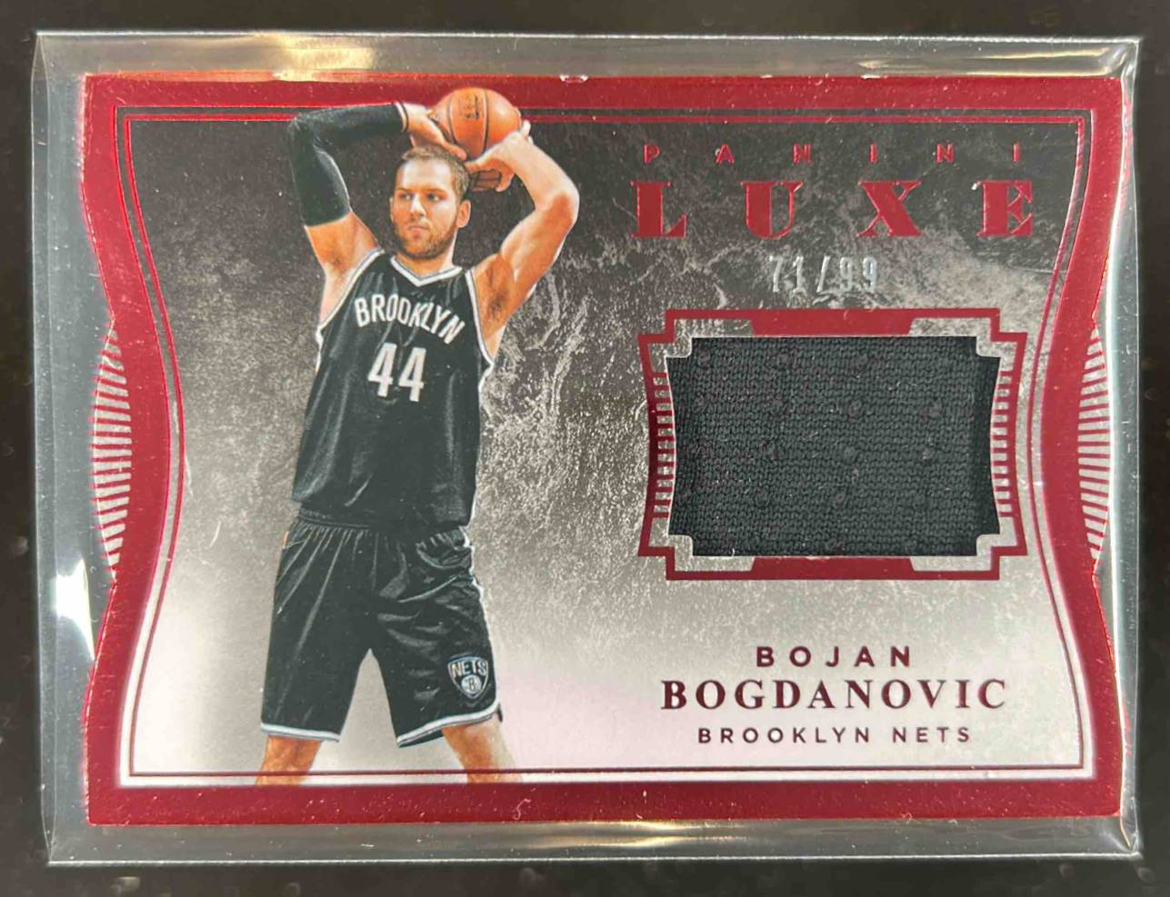 Card image for 2015-16 PANINI LUXE BOJAN BOGDANOVIC MEMORABILIA DIE CUTS RED /99 #4
