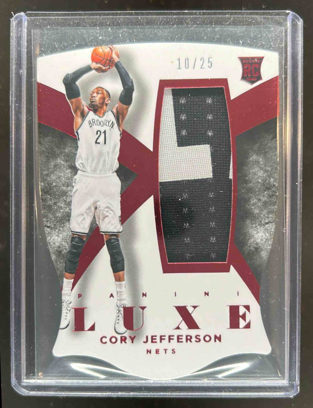 Card image for 2014-15 PANINI LUXE CORY JEFFERSON MEMORABILIA DIE CUTS PRIME RED /25 #15 RC