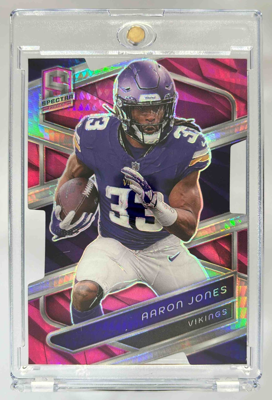 Card image for 2024 Panini Spectra Aaron Jones Neon Pink Die-Cut /20 #70 Vikings