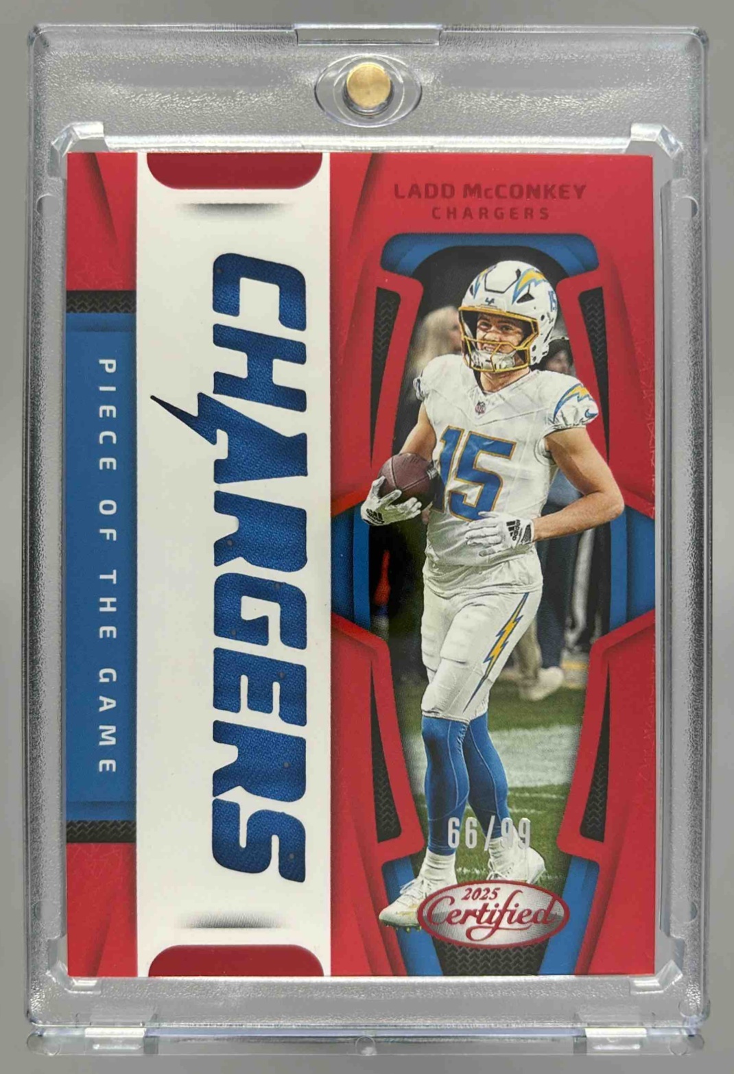 Card image for 2025 Panini Certified Ladd McConkey Piece of the Game Red /99 #POG-LMY Chargers