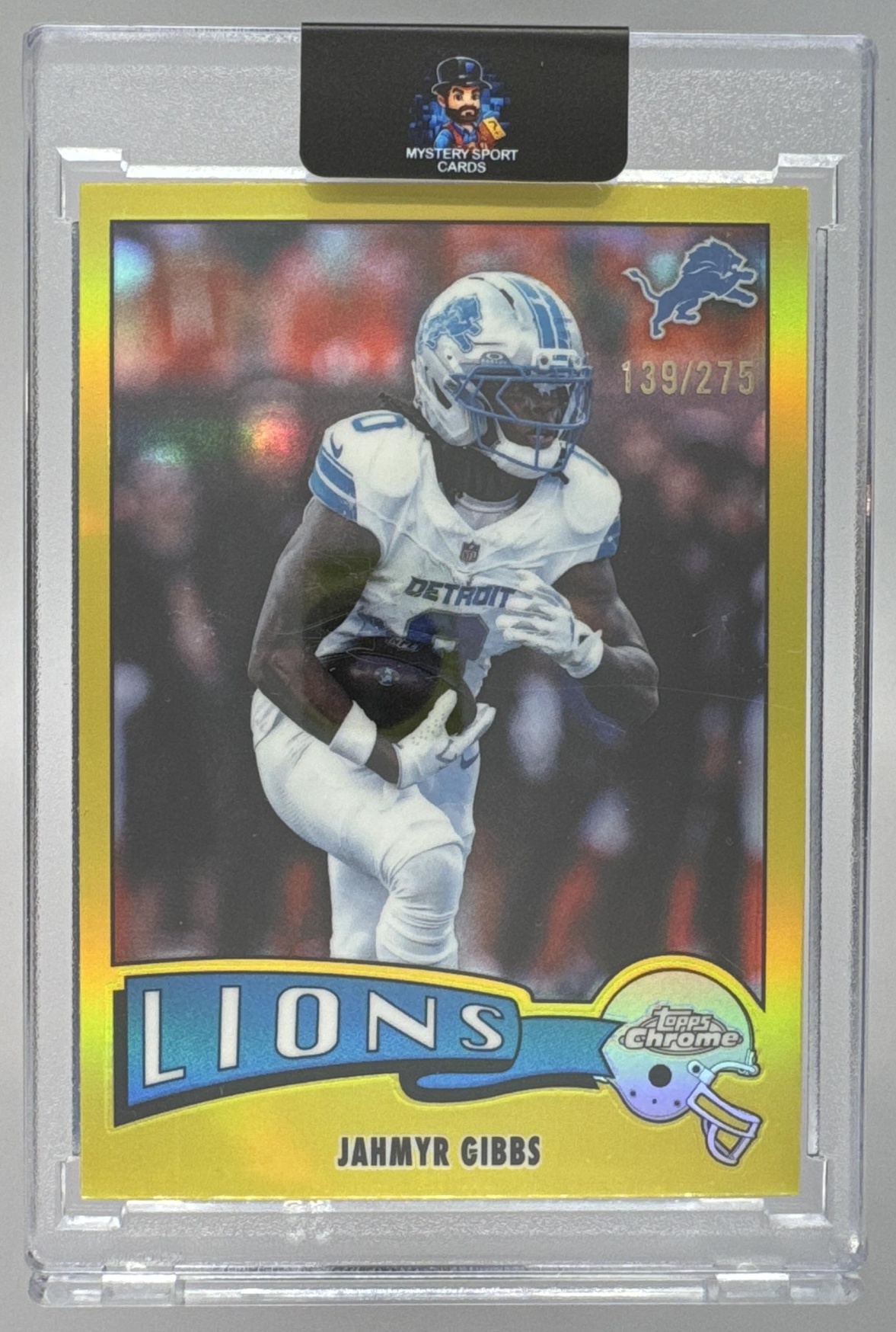 Card image for 2025 Topps Chrome Jahmyr Gibbs 1975 Yellow Refractor /275 #1975-12 Lions