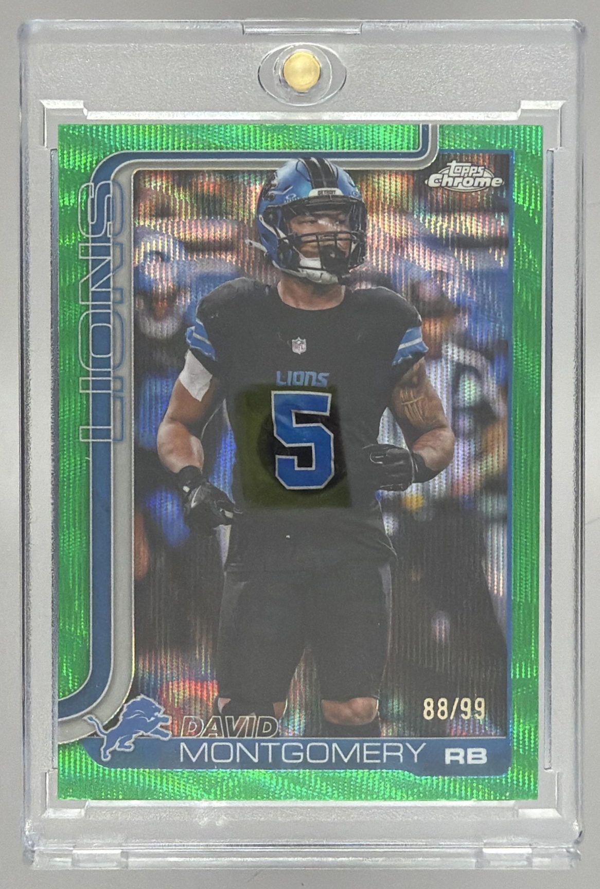 Card image for 2025 Topps Chrome David Montgomery Football Leather Green Refractor /99 #103 Lions