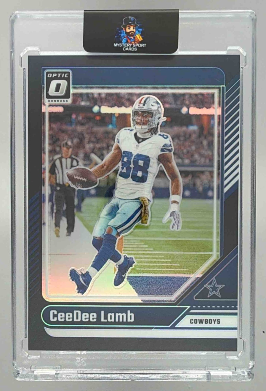 Card image for 2024 Panini Football Donruss Optic CeeDee Lamb Black 1/1 #53 Dallas Cowboys