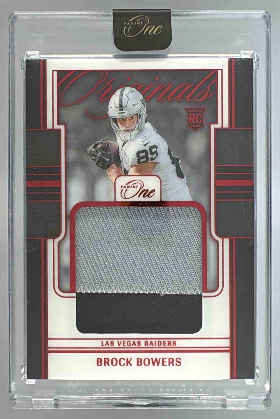 Card image for 2024 Panini Football One Brock Bowers Original Patches Red /49 #OOP-BBS MEM RC