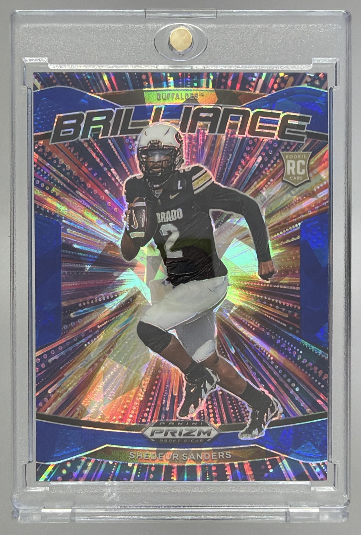 Card image for 2025 Panini Prizm Draft Picks Shedeur Sanders Trophy Hunting Blue Ice /149 #18 Buffaloes