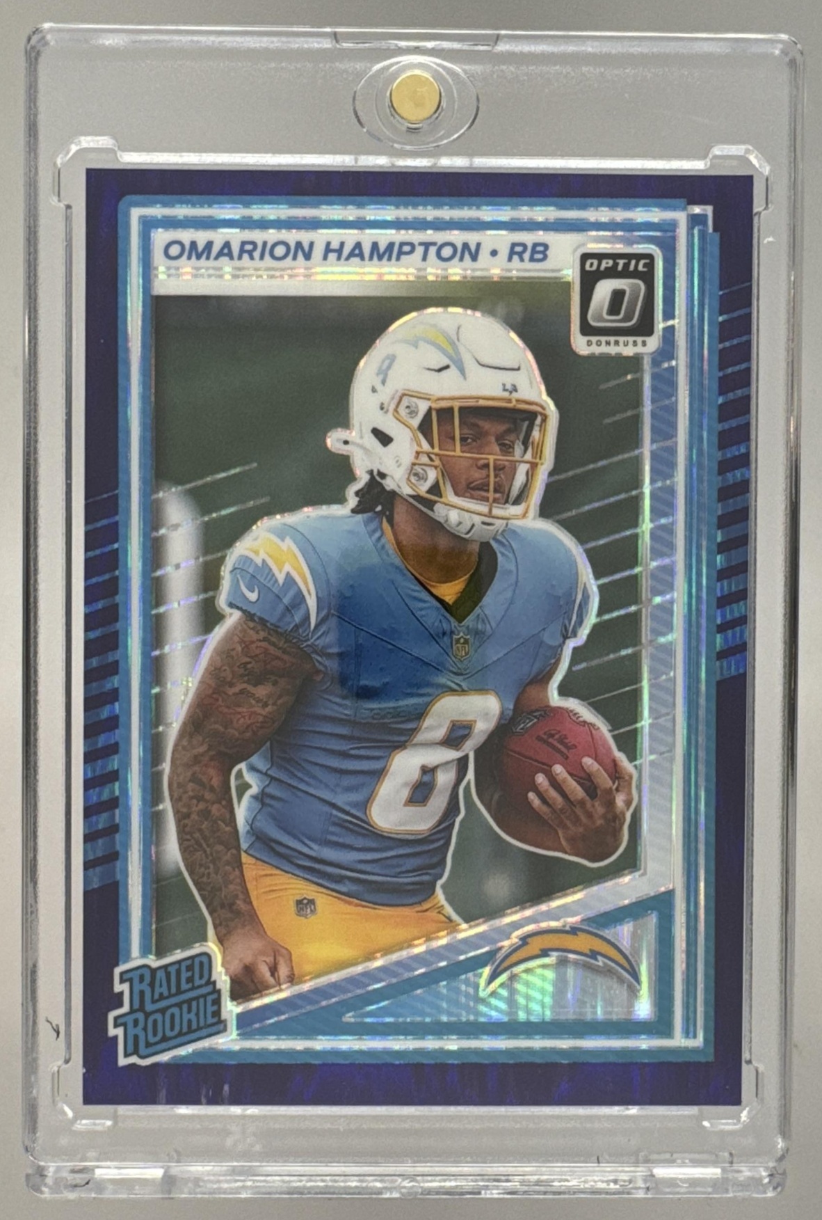 Card image for 2025 Panini Donruss Optic Omarion Hampton Rated Rookie Holo Prizm #212 Chargers